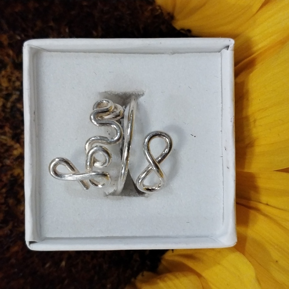 New .925 silver "love and infinite ♾️ " ring. Adjustable #5 -#7.5